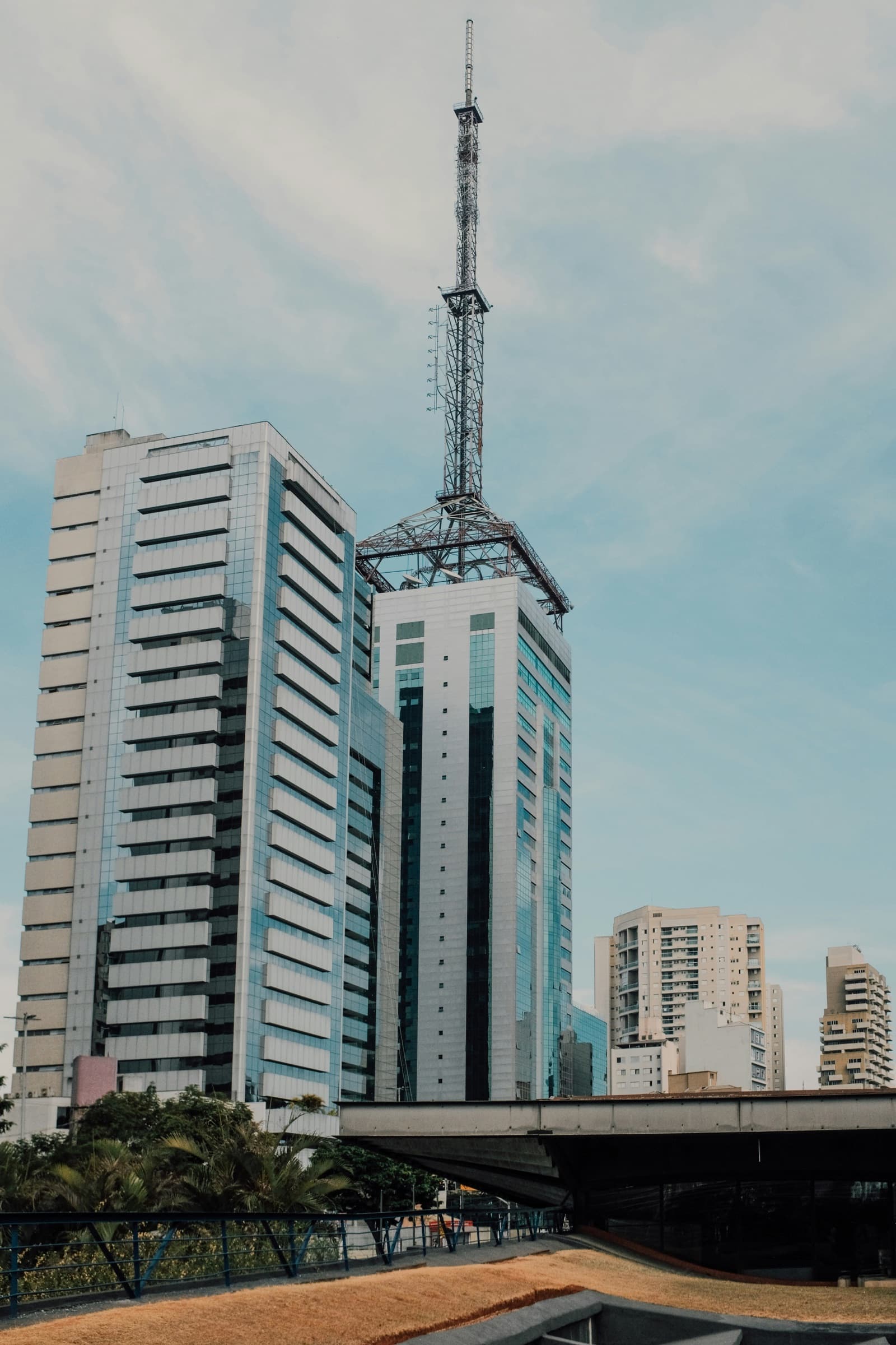 Residential towers rising over a low-built neighbourhood
