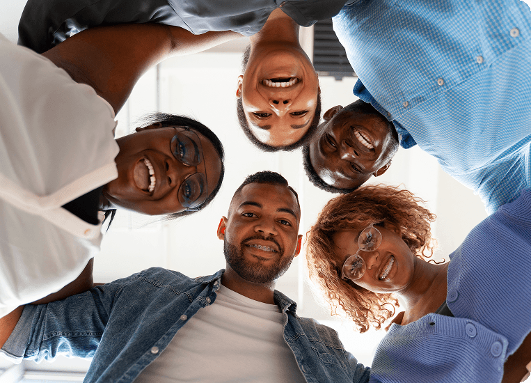 Group of diverse InversePay agents smiling together